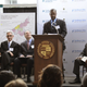 Carl Allamby (center) speaks to an audience at Cleveland State University.